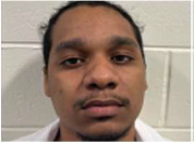 EXCLUSIVE: ICE Arrests 5 Illegal Aliens Convicted of 'Repulsive' Crimes 4 A man with short dark hair and facial hair is looking at the camera with a neutral expression. He is standing in front of a white brick wall.