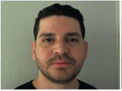EXCLUSIVE: ICE Arrests 5 Illegal Aliens Convicted of 'Repulsive' Crimes 5 A man with short dark hair and a trimmed beard looks directly at the camera, standing against a plain light-colored wall.