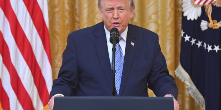 Trump works in a midterm campaign pitch into a primetime address