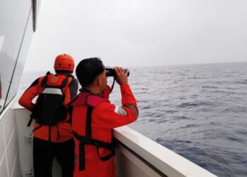 Rescuers in Indonesia find mother and son survivors from sunken passenger boat