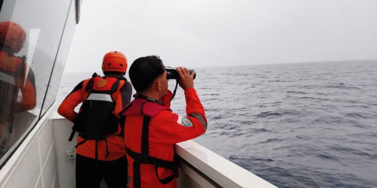 Rescuers in Indonesia find mother and son survivors from sunken passenger boat