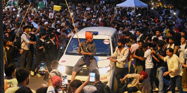 India protest movement holds capital sit-in as police crack down on demonstrators