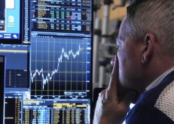 Stocks waver while crude oil prices fall for the first time in a week