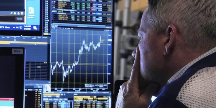 Stocks waver while crude oil prices fall for the first time in a week