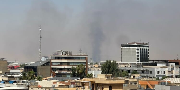 Drones target northern Iraqi city where American forces are based as U.S.-Iran fighting escalates