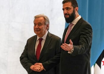 The U.N. chief on a visit to Damascus urges the international community to support Syrian people