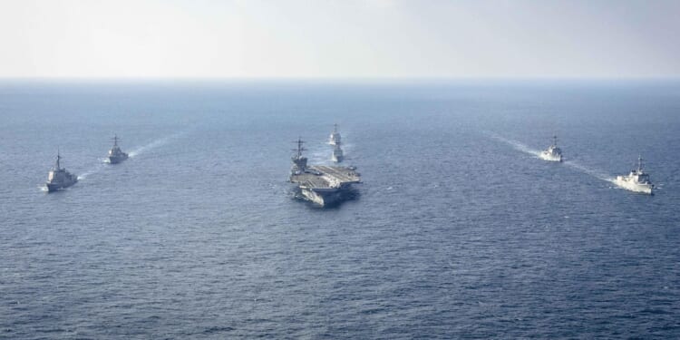 Navy carrier strike group patrolling tension-filled South China Sea
