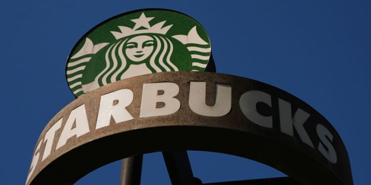 Starbucks reports strong quarterly sales and raises annual outlook