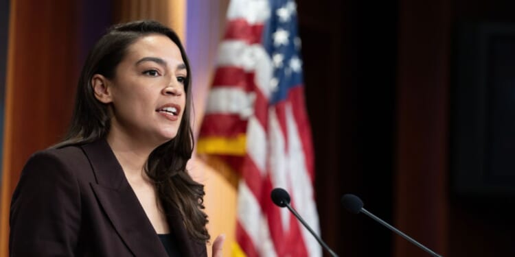 Rep. Alexandria Ocasio-Cortez speaks at a press conference to announce the Artificial Intelligence Data Center Moratorium Act at the U.S. Capitol on March 25, 2026, in Washington, D.C.