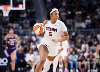 Angel Reese of the Atlanta Dream dribbles the ball through mid-court against the Toronto Tempo during the second half of their WNBA basketball game at the Coca-Cola Coliseum on July 17, 2026, in Toronto, Ontario, Canada.