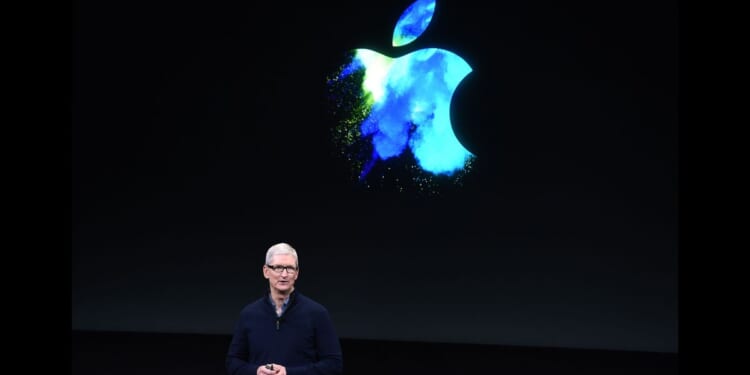 Apple CEO Tim Cook gives a presentation at Apple headquarters in Cupertino, California, on Oct. 27, 2016.
