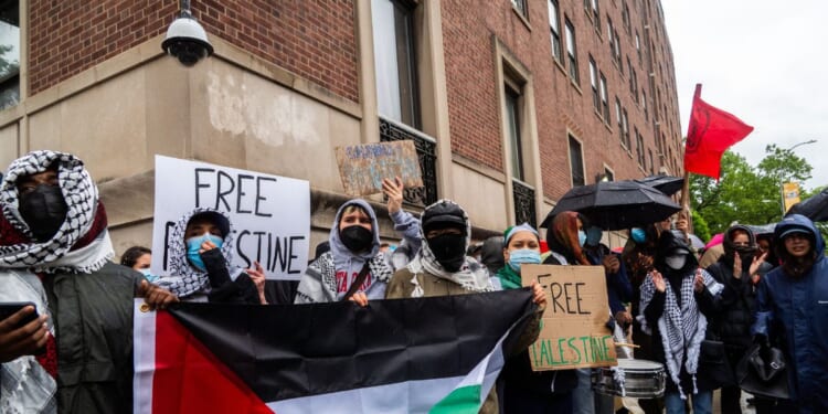 Orthodox Jewish activists join a protest outside Columbia University in solidarity with pro-Palestinian students on May 21, 2025.