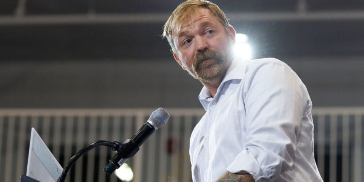 U.S. Senate candidate Graham Platner, a Maine Democrat, speaks at his primary election event on June 9 in Blue Hill, Maine.