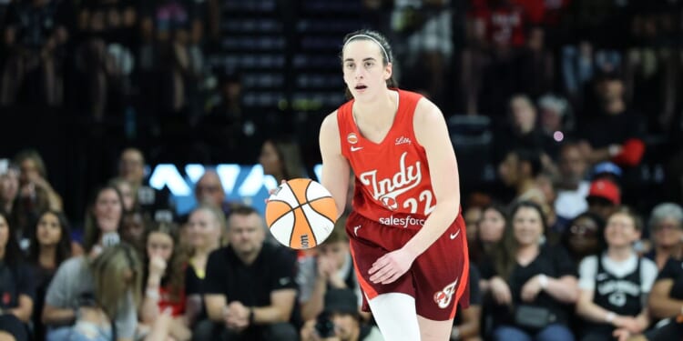 Caitlin Clark of the Indiana Fever brings the ball up the court against the Las Vegas Aces in the fourth quarter of their game at Michelob ULTRA Arena on July 12, 2026, in Las Vegas, Nevada.