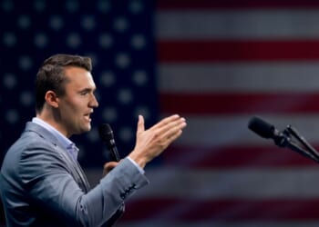 Charlie Kirk, who founded Turning Point USA, speaks before former President Donald Trump's arrival during a Turning Point USA Believers Summit conference at the Palm Beach Convention Center on July 26, 2024, in West Palm Beach, Florida.