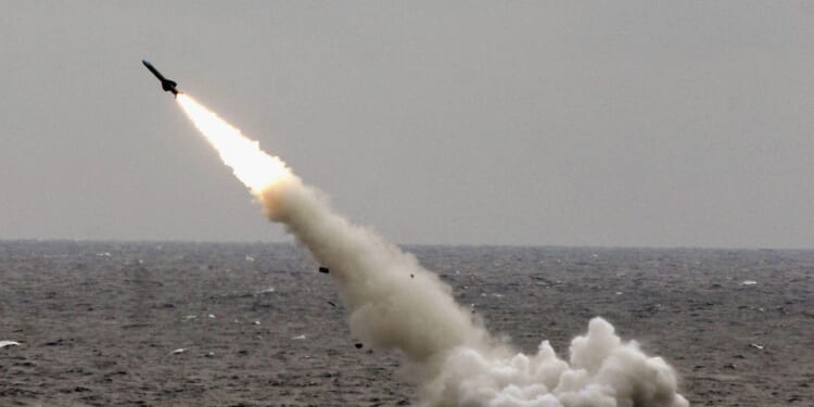A Chinese submarine launches a missile in an offshore blockade exercise during the third phase of the Sino-Russian "Peace Mission 2005" joint military exercise, held Aug. 23, 2005, near China's Shandong Peninsula.