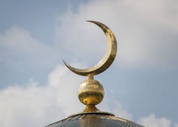 The Islamic crescent on a mosque.