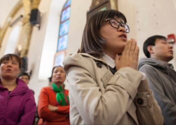 Chinese Christians worship in the Cathedral of the Immaculate Conception on March 24, 2016 in Beijing, China.