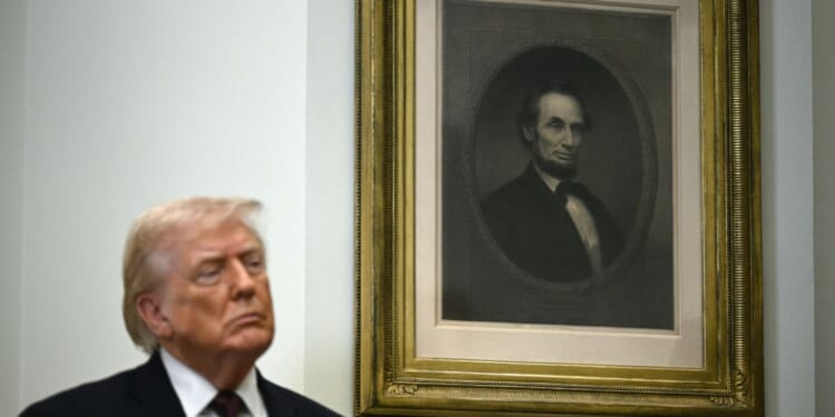 President Donald Trump stands next to a portrait of Abraham Lincoln after making an announcement regarding drug prices from the Roosevelt Room of the White House in Washington, D.C., on Dec. 19, 2025.