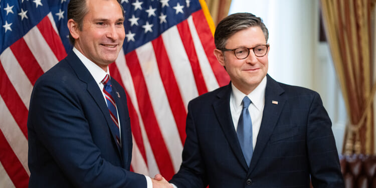 Rep. Matt Van Epps shakes hands with Speaker of the House Mike Johnson. Van Epps says socialism is "antithetical" to the Declaration of Independence.
