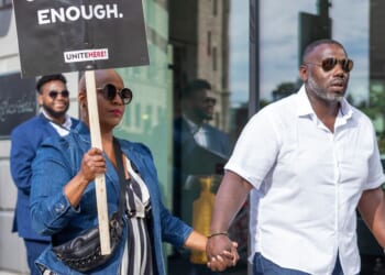 Rep. Ayanna Pressley and her husband, Conan Harris, join picketing hotel workers at the Boston Park Plaza Hotel on Sept. 2, 2024, in Boston, Massachusetts.