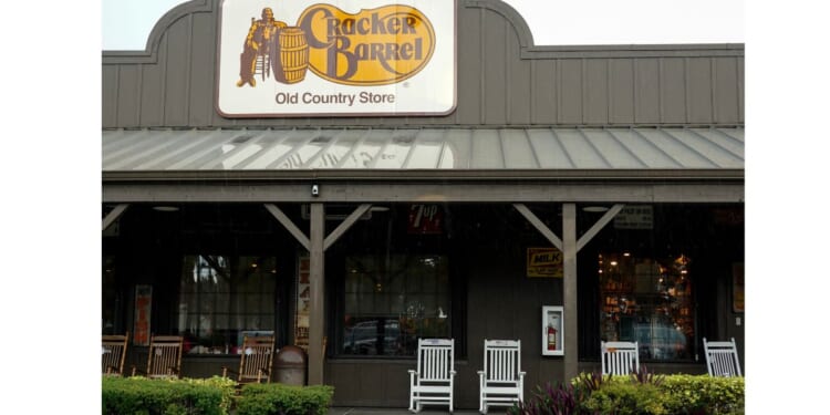 A Cracker Barrel sign featuring the old logo hangs outside of a restaurant on Aug. 27, 2025, in Florida City, Florida.
