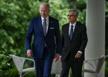 Then President Joe Biden (L) and then-Attorney General Merrick Garland (R) walk into the Rose Garden from the Oval Office for an event on May 13, 2022. (Brendan Smialowski/AFP via Getty Images)