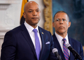 Maryland Governor Wes Moore, Maryland AG Anthony Brown, and Dr. Jeff Kukucka, a legal psychologist from Towson University, announce the findings of an independent audit of the Maryland Office of the Chief Medical Examiner. The report found that in more than half of the 87 cases reviewed, the case reviewers disagreed with the OCME's original determination of manner of death. (Photo by Robb Hill for The Washington Post via Getty Images)