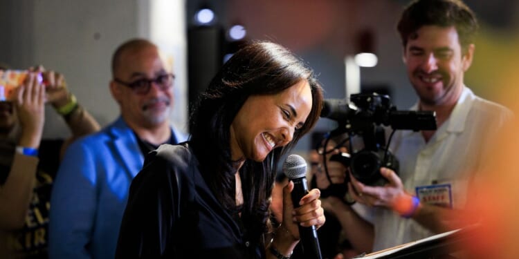 Democratic congressional candidate Melat Kiros speaks to supporters at an election night watch party after winning the Colorado primary on June 30, 2026, in Denver, Colorado.