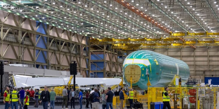 A Boeing 737 MAX 10 fuselage is pictured during the opening ceremony for the company's new North Line assembly line, which will produce 737 MAX aircraft, at the Boeing Everett Factory in Everett, Washington, on July 10, 2026.
