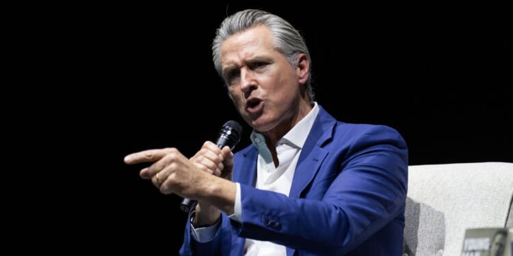 California Gov. Gavin Newsom gestures at an event promoting his book "Young Man in a Hurry" on Feb. 28, 2026, in San Francisco, California.
