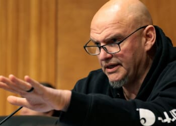 U.S. Sen. John Fetterman, pictured at a hearing in a February file photo.