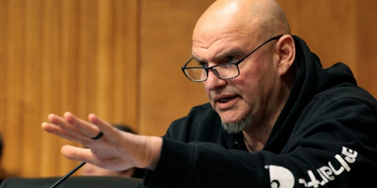 U.S. Sen. John Fetterman, pictured at a hearing in a February file photo.