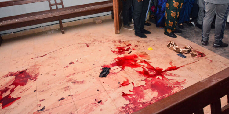 Gunmen with explosives stormed a Catholic church and opened fire in southwest Nigeria.