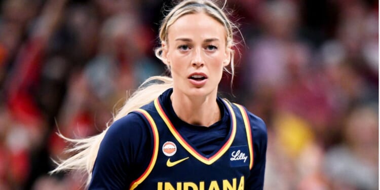 Sophie Cunningham #8 of the Indiana Fever plays against the New York Liberty during the first half of the July 18 game in Indianapolis, Indiana.