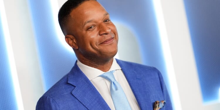 Craig Melvin standing