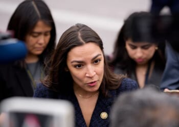 Rep. Alexandria Ocasio-Cortez speaks to members of the media as she arrives for the last votes of the week at the U.S. Capitol Building on May 21, 2026, in Washington, D.C.