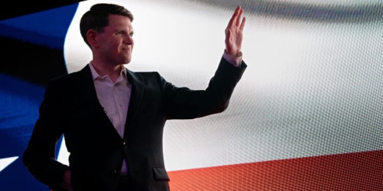 Texas Senate Candidate James Talarico waves to a crowd at Houston, Texas on a campaign stop.