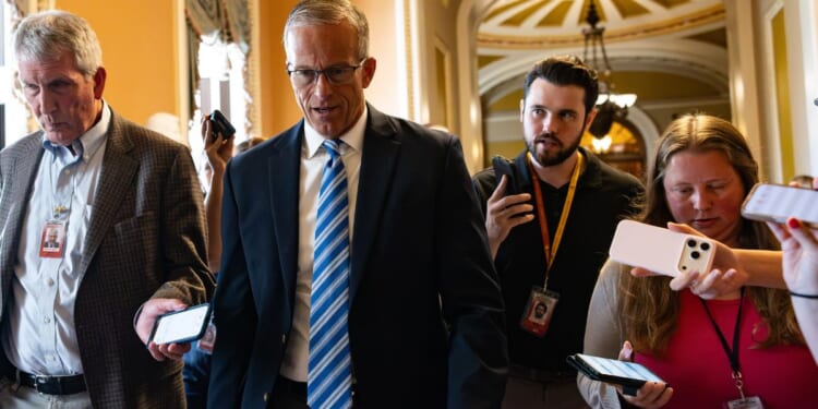 Senate Majority Leader John Thune walks from the Senate Chambers in the U.S. Capitol Building on July 23, 2026, in Washington, D.C.