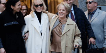 E. Jean Carroll (L) and her lawyer Roberta Kaplan (R) leave Manhattan Federal Court following the conclusion of the civil defamation trial against former President Donald Trump on January 26, 2024 in New York City. A jury awarded Carroll a total of $83.3 million dollars in her week long civil defamation trial against former President Trump, including $18.3 million in compensatory damages and $65 million in punitive damages, finding that Trump acted maliciously for one of the two statements at issue. (Photo by Michael M. Santiago/Getty Images)