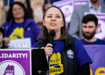Maine Secretary of State and candidate for Governor Shenna Bellows speaks during a May Day rally organized by local unions.