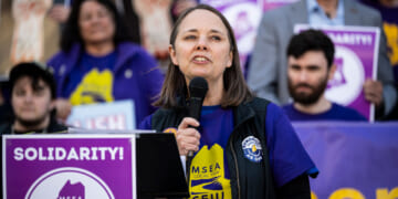 Maine Secretary of State and candidate for Governor Shenna Bellows speaks during a May Day rally organized by local unions.