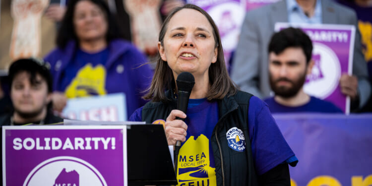 Maine Secretary of State and candidate for Governor Shenna Bellows speaks during a May Day rally organized by local unions.