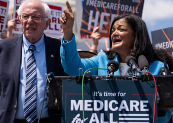 Sen. Bernie Sanders and Rep. Pramila Jaypal at a news conference.