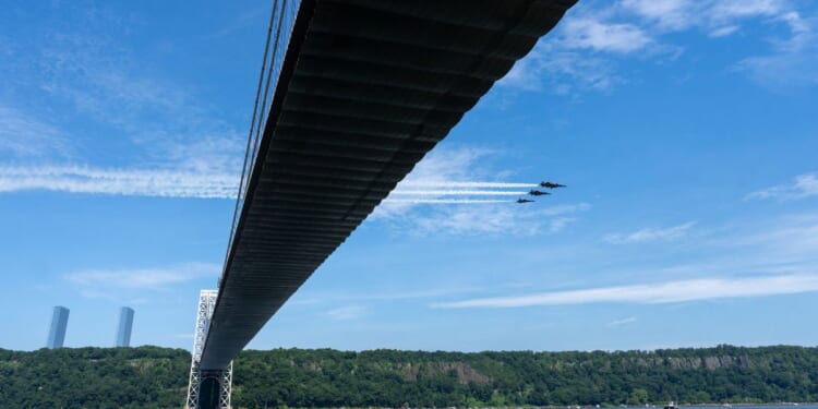 Blue Angel fighter jets fly over the George Washington Bridge on July 4, 2026, in New York City.