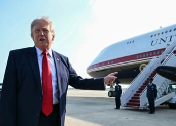 President Donald Trump speaks to the press before he boards Air Force One for his first flight aboard the Boeing 747-8 that Qatar gifted the United States to use for executive travel, at Joint Base Andrews, in Maryland, on July 1, 2026.
