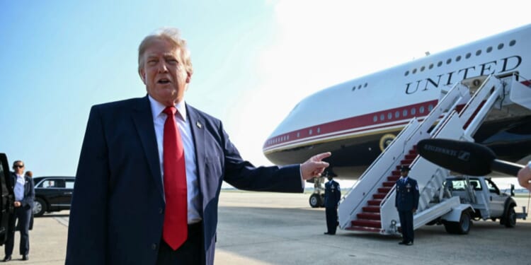 President Donald Trump speaks to the press before he boards Air Force One for his first flight aboard the Boeing 747-8 that Qatar gifted the United States to use for executive travel, at Joint Base Andrews, in Maryland, on July 1, 2026.
