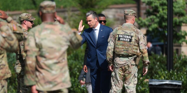 Secretary of War Pete Hegseth greets members of the U.S. National Guard after an event at Meridian Hill Park on July 2, 2026, in Washington, D.C.