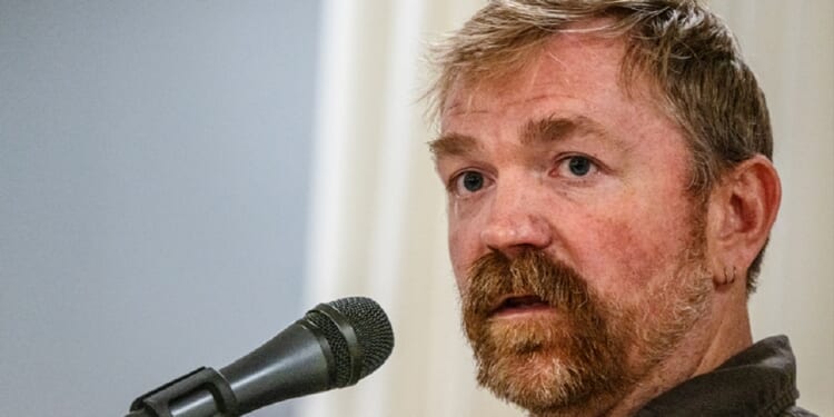 Democratic U.S. Senate candidate in Maine Graham Platner speaks on stage in a June file photo.