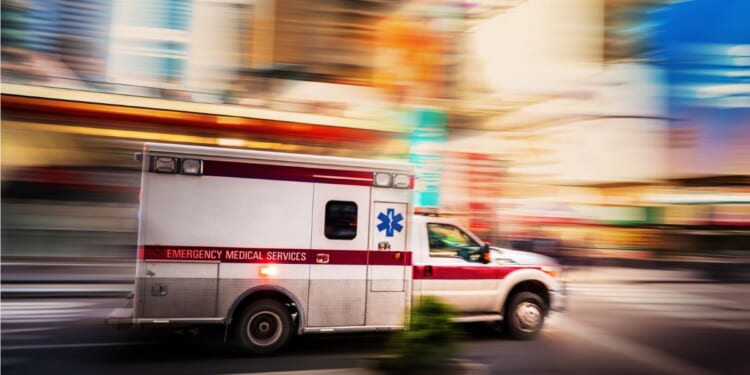 An ambulance races through Manhattan in a file photo from 2022.
